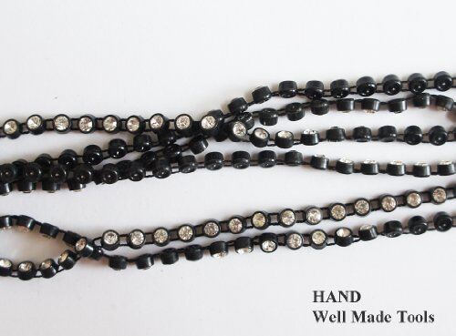 Spool of black diamante trim ready for use in crafts