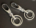 Two NO.4 solid all metal double key rings displayed together.