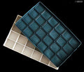 Plastic artists palette box with rubber lid and 24 wells