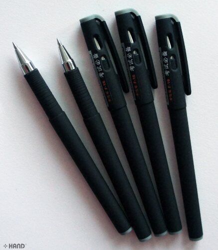 Set of five F-16 fine point black ink pens arranged neatly.