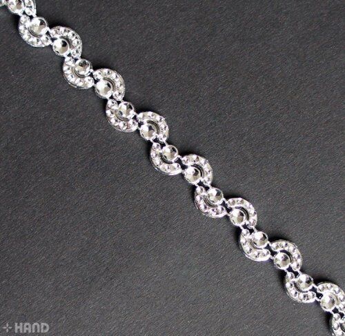 Pretty Silver Moon Shape Trims displayed in a creative arrangement