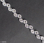Pretty Silver Moon Shape Trims displayed in a creative arrangement