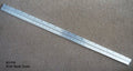 Double side ruler showing metric measurements in inches and centimetres.