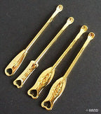 Close-up of a metal earpick showcasing its smooth design.