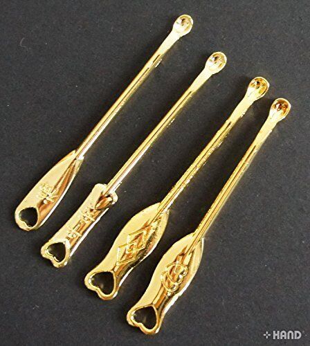 Close-up of a metal earpick showcasing its smooth design.