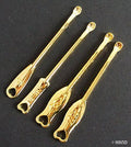 Two metal earpicks for ear wax removal displayed on a white background.