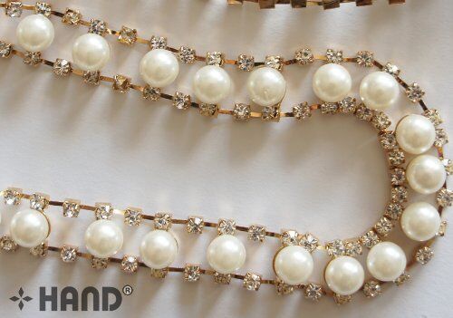 Close-up of luxury pearl diamante trim embellishment