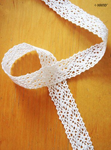 Close-up of NO.6 white cotton lace trim, 23mm wide.
