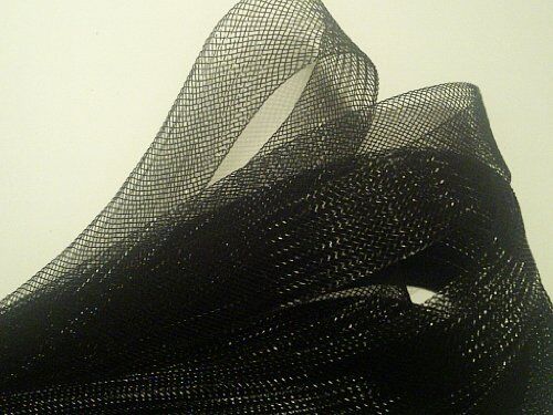 Close-up of black nylon crin trim showing texture