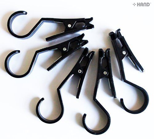 Close-up of a plastic fabric sample hanger showing its design