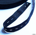 Roll of black fold-able clean finishing elastic, 2cm wide.