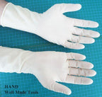 Pack of 6 small extra strength latex gloves displayed in a box.