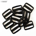 Pack of 20 black webbing slide buckles displayed together.