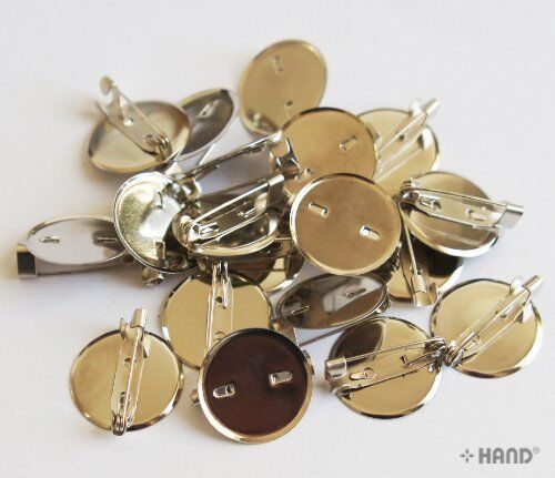 Pack of 100 silver plate badge pins displayed in a row