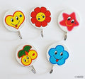 Three colourful kids cartoon self-adhesive hooks displayed.