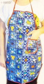 Kids' aprons displayed showing vibrant colours and patterns
