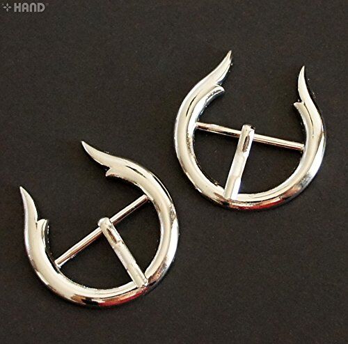 Close-up of metal silver tone shoe boots handbag buckles