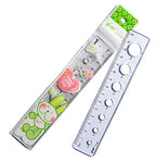 Two small pocket pencil cases with a 15cm ruler and stencil designs.