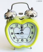 Apple-shaped alarm clock in assorted colours