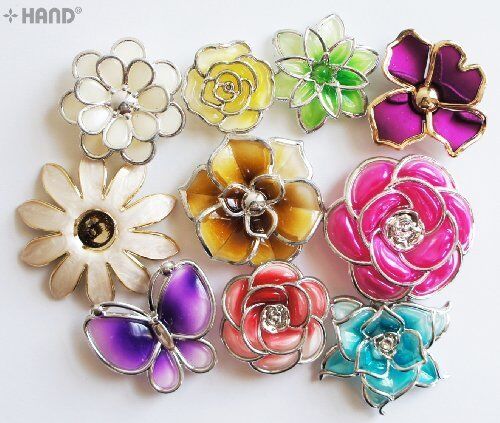 Close-up of decorative plastic flower trims for crafting.