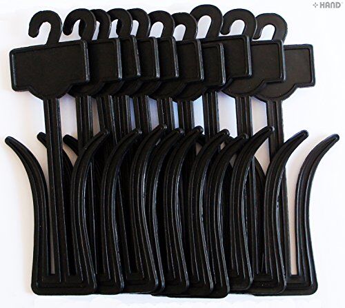 Close-up of a plastic black shoe hanger holding a slipper