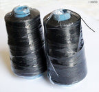 Black sewing thread spool showing strong and durable material.