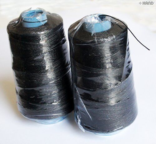 Black sewing thread spool showing strong and durable material.