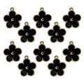 Five petals black and gold flower trim on a white background.