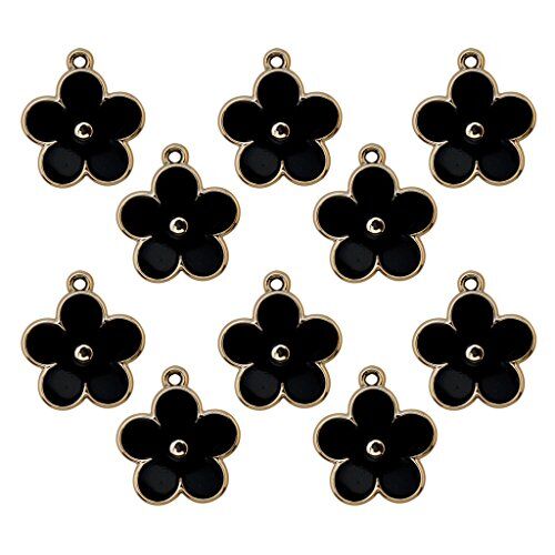 Five petals black and gold flower trim on a white background.
