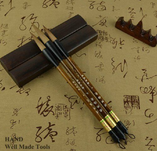 Two medium stroke Sumi brushes with comfort grip handles.