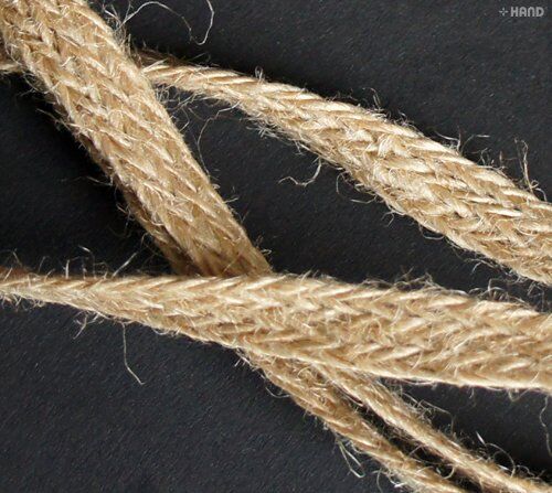 Rough flax and wool brown plait rope trim in a crafting setting