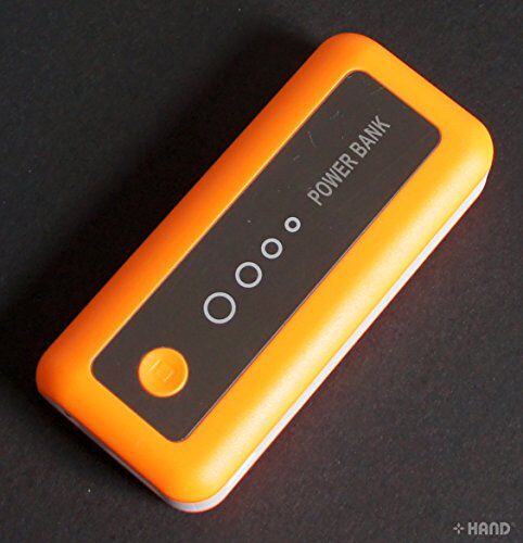 Close-up of the external battery charger showing ports