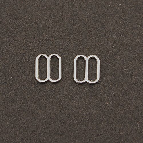 Pack of approximately 50 metal lingerie sliders displayed.