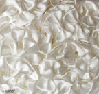 Craft project using satin white ribbon bows
