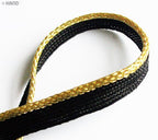 Roll of black with gold edge sew in pipe trim for crafting