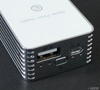 Power bank showing charging status indicator