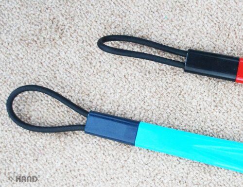 Shoehorn in use, helping to easily slip on shoes.