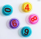 Close-up of colourful magnetic number 3