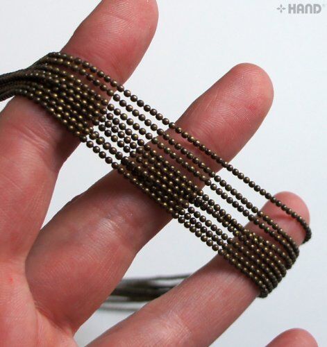 Close-up of 1.5mm round ball bead chain in dark copper