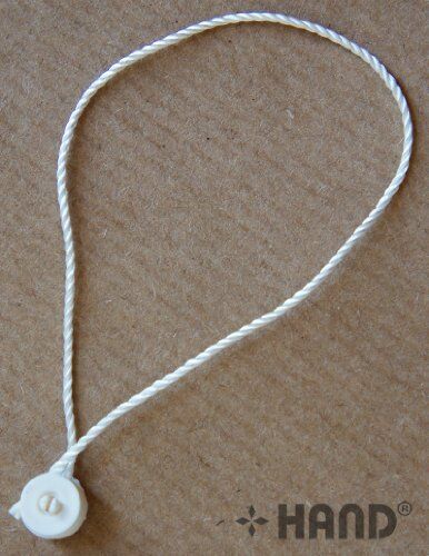 Close-up of the silk white nylon string hang tag.