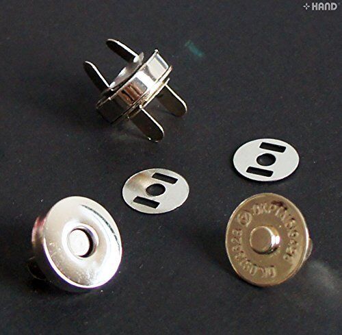 Both sizes of silver magnetic snap buttons arranged together.