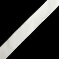 Off white flat smooth knitted elastic on a roll