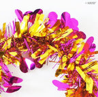 Gold heart tinsel garland displayed on a table