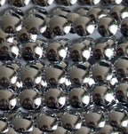 Close-up of Silver Flat Round Trims showing texture and shine.