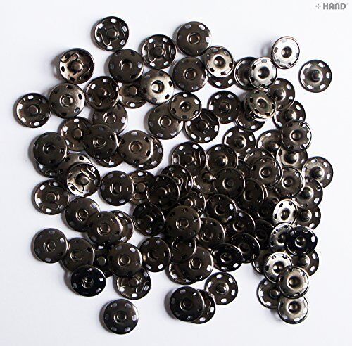 Close-up of dark copper snap studs in 21mm size