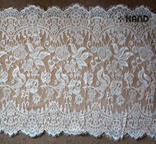 S12 Vintage Cream Wide Corded Lace displayed flat