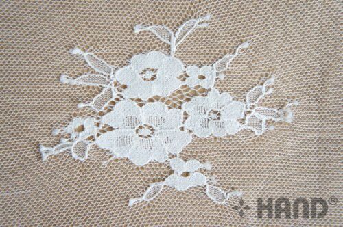 Detail of the intricate pattern on black corded lace