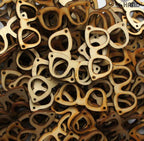 Close-up of decorative wooden glasses trim