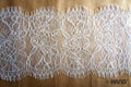 White corded lace border trim, 175mm wide, displayed on a roll.
