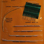 Close-up of assorted sewing needles in the RNP-27 set